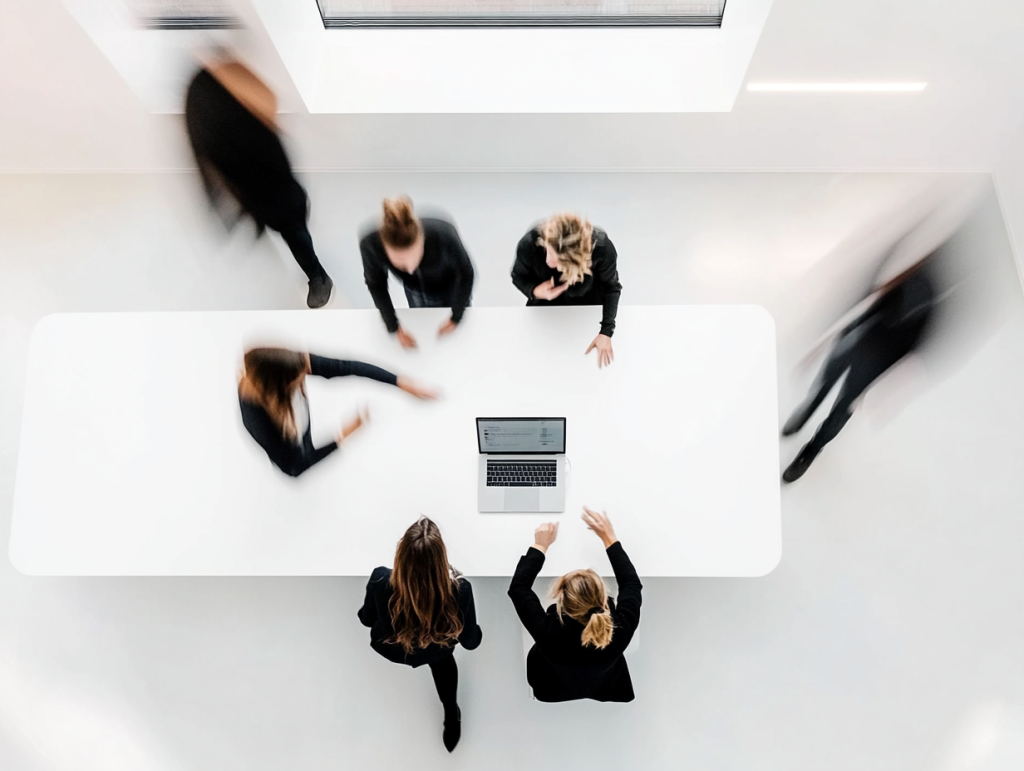 676d0dd3326856ce632c3574_snitchesarewelcome_overhead_view_of_collaborative_moment_team_cb1cafbf.png
